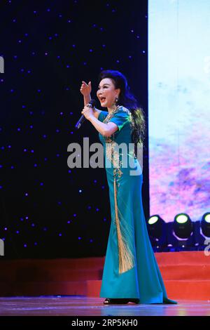 Luannan County - January 25, 2019: Peking Opera Chorus on stage, Luannan County, Hebei Province, China Stock Photo