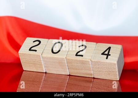 year 2024, Flag of Poland, Concept, Economic and political expectations in 2024, Important events In the new year for Poles Stock Photo