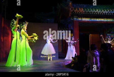 (181221) -- BEIJING, Dec. 21, 2018 (Xinhua) -- File photo taken on Sept. 28, 2016 shows performers dancing at the Palace Museum in Beijing, capital of China. The Palace Museum, also known as the Forbidden City, has taken new approaches, such as TV show, music and games, to promote its cultural relics and Chinese traditional culture. It reaches out to the public with new digital technology by integrating modern technology with its history and splendid traditional culture spanning 600 years. Visitors may walk directly into the emperor s residence and, through VR, see everything as it was in its Stock Photo