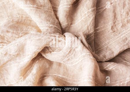 Beige cotton fabric texture. Coarse twisted fabric, background. Stock Photo
