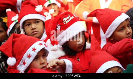 (181224) -- KATHMANDU, Dec. 24, 2018 -- A Nepalese teacher dressed up