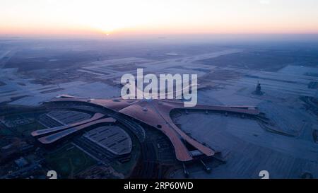 (181229) -- BEIJING, Dec. 29, 2018 -- Aerial photo taken on Dec. 29, 2018 shows the Beijing Daxing International Airport under construction in Beijing, capital of China. The new airport s facade decoration project was completed on Friday. The airport is scheduled to start test operation by September next year.) CHINA-BEIJING-NEW AIRPORT-FACADE(CN) JuxHuanzong PUBLICATIONxNOTxINxCHN Stock Photo