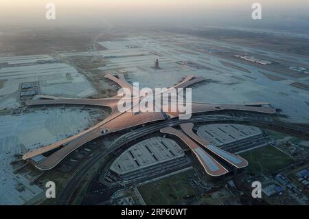 (181229) -- BEIJING, Dec. 29, 2018 -- Aerial photo taken on Dec. 29, 2018 shows the Beijing Daxing International Airport under construction in Beijing, capital of China. The new airport s facade decoration project was completed on Friday. The airport is scheduled to start test operation by September next year.) CHINA-BEIJING-NEW AIRPORT-FACADE(CN) JuxHuanzong PUBLICATIONxNOTxINxCHN Stock Photo