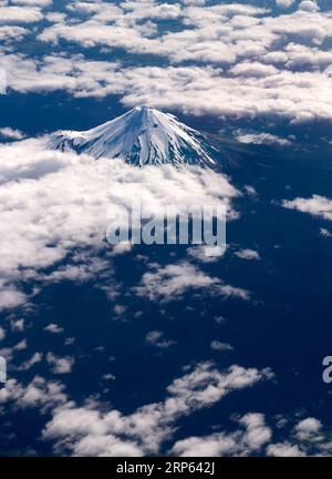 (190101) -- NEW PLYMOUTH, Jan. 1, 2019 (Xinhua) -- File photo taken on Nov. 8, 2018 shows an aerial view of Mount Taranaki in New Plymouth, New Zealand. People called Mount Taranaki beautiful but deadly since nearly 100 people have died in climbing accidents on the slopes of Mt Taranaki since records began in the 1890s. Local scientist predicted that Mt Taranaki is due geologically speaking for an eruption - and it could be catastrophic if it happened one day. (Xinhua/Guo Lei) NEW ZEALAND-NEW PLYMOUTH-MT TARANAKI-SCENERY PUBLICATIONxNOTxINxCHN Stock Photo