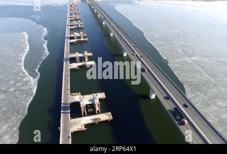 (190102) -- BEIJING, Jan. 2, 2019 (Xinhua) -- Aerial photo taken on Feb. 14, 2017 shows the under-construction bridge of the Jingzhang High-speed Railway across the Guanting Reservoir in Huailai County of Zhangjiakou City, north China s Hebei Province. The 18th Central Committee of the Communist Party of China (CPC) held the third plenary session in November, 2013. In the five years since then, China s reform momentum had been particularly strong as the CPC decided to advance reform in all aspects during the meeting. Since the third plenary session, Chinese President Xi Jinping has presided ov Stock Photo