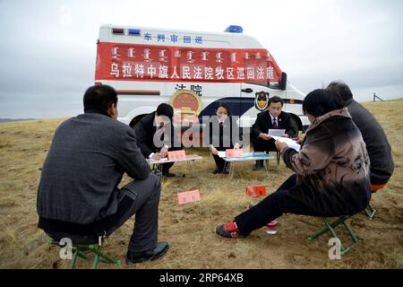 (190102) -- BEIJING, Jan. 2, 2019 (Xinhua) -- The circuit court for the pastoral areas of Urad Middle Banner mediates a civil dispute in Urad Middle Banner, north China s Inner Mongolia Autonomous Region, Oct. 30, 2014. The 18th Central Committee of the Communist Party of China (CPC) held the third plenary session in November, 2013. In the five years since then, China s reform momentum had been particularly strong as the CPC decided to advance reform in all aspects during the meeting. Since the third plenary session, Chinese President Xi Jinping has presided over at least 45 high-profile meeti Stock Photo