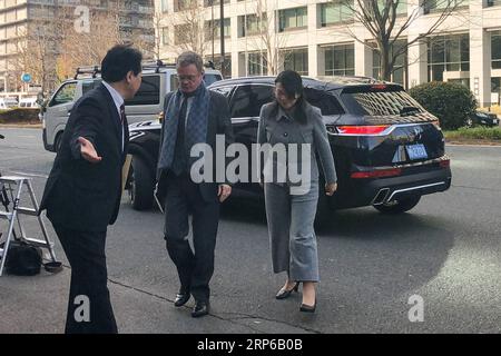 (190108) -- TOKYO, Jan. 8, 2019 -- French Ambassador to Japan Laurent Pic (C) enters the Tokyo District Court in Tokyo, Japan, Jan. 8, 2019. Nissan Motor Co. s former Chairman Carlos Ghosn on Tuesday appeared in public for the first time since his arrest on Nov. 19 at a Tokyo court where he robustly maintained his innocence regarding allegations of financial misconduct that has led to his lengthy detention. At the request of Ghosn and his lawyers, he was granted permission to voice his opinions in the court for the first time since his arrest on the allegations he vastly under-reported his rem Stock Photo