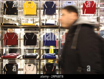 (190108) -- FLORENCE (ITALY), Jan. 8, 2019 -- A man visits the 95th Pitti Immagine Uomo exhibition in Florence, Italy, Jan. 8, 2019. The exhibition, one of the world s most important platforms for men s clothing and accessory collections, is held here from Jan. 8 to 11. ) ITALY-FLORENCE-MEN S CLOTHING AND ACCESSORY-EXHIBITION ChengxTingting PUBLICATIONxNOTxINxCHN Stock Photo