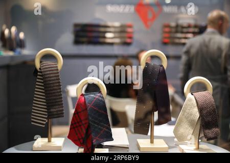 (190108) -- FLORENCE (ITALY), Jan. 8, 2019 -- People visit the 95th Pitti Immagine Uomo exhibition in Florence, Italy, Jan. 8, 2019. The exhibition, one of the world s most important platforms for men s clothing and accessory collections, is held here from Jan. 8 to 11. ) ITALY-FLORENCE-MEN S CLOTHING AND ACCESSORY-EXHIBITION ChengxTingting PUBLICATIONxNOTxINxCHN Stock Photo