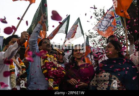 (190110) -- MUMBAI, Jan. 10, 2019 -- Members of the Bharatiya Janata Party celebrate the establishment of quota for poor upper-caste people in government jobs ahead of national elections, in Mumbai, India, Jan. 10, 2019. ) INDIA-MUMBAI-BHARATIYA JANATA PARTY CELEBRATION Stringer PUBLICATIONxNOTxINxCHN Stock Photo