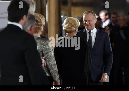 (190110) -- BUCHAREST, Jan. 10, 2019 -- European Council President Donald Tusk (1st R) arrives at the Romanian Atheneum for an official inauguration ceremony marking the start of Romania s Presidency of the Council of the European Union (EU) in Bucharest, capital of Romania, on Jan. 10, 2019. Romania takes over a forefront role on a European level, through the Presidency of the Council of the European Union (EU), and the main objective of its mandate is the consolidation of a more cohesive, more united and stronger Europe, President Klaus Iohannis said late Thursday at the official inauguratio Stock Photo