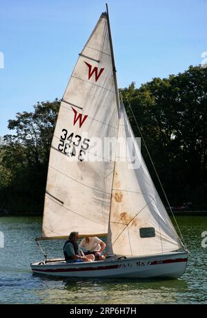 A yacht on Fairhaven Lake, Lytham St Annes, Lancashire, United Kingdom, Europe Stock Photo