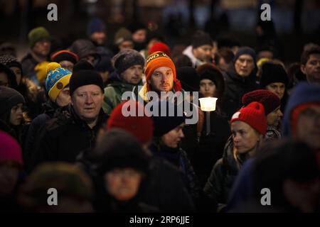 (190115) -- WARSAW, Jan. 15, 2019 -- People march in commemoration of Pawel Adamowicz, the late Mayor of the Polish port city of Gdansk, in center of Warsaw, Poland, Jan. 14, 2018. The UN refugee agency, UNHCR, said Monday it is deeply shocked and saddened to hear that Pawel Adamowicz has died after being stabbed at a charity event. Adamowicz launched the Gdansk Immigrant Integration Model in 2016, a model that has inspired other Polish cities, said the UN agency. The agency wrote in February 2018 that the Gdansk Model is a comprehensive program to help refugees and migrants integrate. ) POLAN Stock Photo
