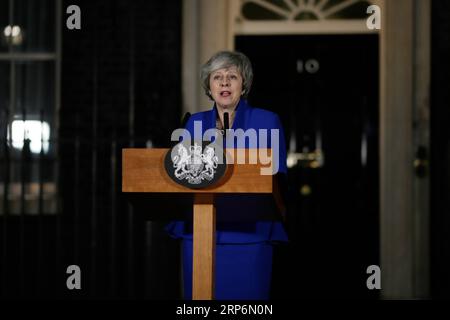 (190117) -- LONDON, Jan. 17, 2019 -- British Prime Minister Theresa May makes a statement outside 10 Downing street, in London, Britain on Jan. 16, 2019. The British government survived a no-confidence vote at the parliament on Wednesday, one day after it suffered a record-breaking Brexit deal vote defeat. ) BRITAIN-LONDON-PM-STATEMENT TimxIreland PUBLICATIONxNOTxINxCHN Stock Photo