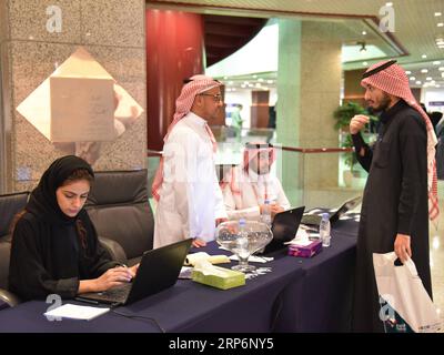 190117-riyadh-jan-17-2019-a-saudi-student-registers-for-an-ict-information-and-communications-technology-talent-job-fair-in-riyadh-saudi-arabia-on-jan-17-2019-huawei-chinese-technology-giant-has-co-launched-an-ict-information-and-communications-technology-talent-job-fair-with-saudi-arabian-ministry-of-communications-and-information-technology-in-riyadh-on-thursday-the-event-providing-more-than-100-job-vacancies-to-saudi-youth-aims-to-promote-promising-students-who-took-part-in-previous-huawei-training-programs-and-offer-them-an-opportunity-to-develop-their-careers-2rp6ny5.jpg