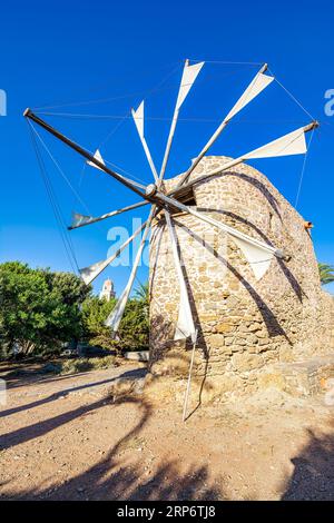 Traditional windmill at Toplou monastery, close to famous Vai beach, Sitia municipality, Lasithi prefecture. Stock Photo