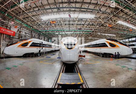 190122 -- BEIJING, Jan. 22, 2019 Xinhua -- Staff members work on the production line of bullet train in Tangshan City, north China s Hebei Province, March 23, 2018. China s economy grew 6.6 percent year on year in 2018, beating the official annual target of around 6.5 percent, data from the National Bureau of Statistics NBS showed Monday. The country s gross domestic product GDP hit 90.03 trillion yuan about 13.32 trillion U.S. dollars in 2018. The following are a group of facts and figures released by the NBS on its solid economic performance last year. -- China s fixed-asset investment grew Stock Photo