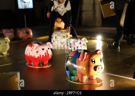 (190124) -- HONG KONG, Jan. 24, 2019 (Xinhua) -- Art works of the pig, the 12th in the 12-year cycle of Chinese zodiac sign, are displayed during a pig-themed exhibition to greet the Spring Festival in Hong Kong, south China, Jan. 23, 2019. The Spring Festival, or the Year of the Pig in the Chinese lunar calendar, will begin on Feb. 5 this year. (Xinhua/Wu Xiaochu) CHINA-HONG KONG-SPRING FESTIVAL-LANTERNS (CN) PUBLICATIONxNOTxINxCHN Stock Photo