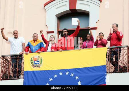 (190124) -- CARACAS, Jan. 24, 2019 -- Image provided by Venezuela s Presidency shows Venezuelan President Nicolas Maduro (C) taking part in a rally in support of his government, at the Miraflores Palace, in Caracas, Venezuela, on Jan. 23, 2019. Venezuelan President Nicolas Maduro on Wednesday announced he was severing diplomatic and political ties with the United States after the U.S. authorities recognized the opposition leader Juan Guaido as the nation s interim president. Venezuela s Presidency) VENEZUELA-U.S.-TIES SEVERING e VENEZUELANxPRESIDENCY PUBLICATIONxNOTxINxCHN Stock Photo