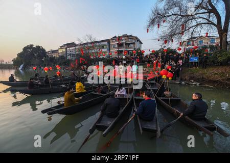 (190124) -- HANGZHOU, Jan. 24, 2019 (Xinhua) -- Villagers watch traditional opera in Hexidai Village of Tangqi Township in Hangzhou, capital of east China s Zhejiang Province, Jan. 23, 2019. Traditional Chinese classical operas like Liang Shanbo and Zhu Yingtai , also known as The Butterfly Lovers are staged in Hexidai Village ahead of the Lunar New Year, or Spring Festival, which falls on Feb. 5 this year. (Xinhua/Xu Yu) CHINA-ZHEJIANG-LUNAR NEW YEAR-FOLK OPERA (CN) PUBLICATIONxNOTxINxCHN Stock Photo