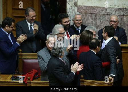 (190125) -- ATHENS, Jan. 25, 2019 -- Greek Prime Minister Alexis Tsipras (2nd R) is greeted after the vote on a deal of the use of the name Macedonia in Athens, Greece, on Jan. 25, 2019. Greece s parliament approved on Friday the historic agreement reached last summer which resolves a nearly 28-year-old dispute between Greece and the Former Yugoslav Republic of Macedonia (FYROM) over the use of the name Macedonia. ) GREECE-ATHENS-PARLIAMENT-MACEDONIA NAME AGREEMENT-RATIFYING MariosxLolos PUBLICATIONxNOTxINxCHN Stock Photo