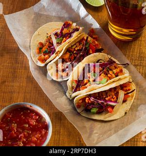 Delicious tacos with sauce arrangement Stock Photo
