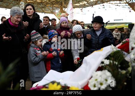 (190205) -- SARAJEVO, Feb. 5, 2019 -- People pay tribute to victims of the 1994 massacre in Sarajevo marketplace in Sarajevo, Bosnia and Herzegovina (BiH), on Feb. 5, 2019. A mortar shell exploded in the marketplace in Sarajevo on Feb. 5, 1994, killing 68 people and wounding more than 140. ) BOSNIA AND HERZEGOVINA-SARAJEVO-MASSACRE-ANNIVERSARY NedimxGrabovica PUBLICATIONxNOTxINxCHN Stock Photo