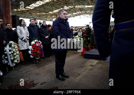 (190205) -- SARAJEVO, Feb. 5, 2019 -- Zeljko Komsic (C), member of the Presidency of Bosnia and Herzegovina, pays tribute to victims of the 1994 massacre in Sarajevo marketplace in Sarajevo, Bosnia and Herzegovina (BiH), on Feb. 5, 2019. A mortar shell exploded in the marketplace in Sarajevo on Feb. 5, 1994, killing 68 people and wounding more than 140. ) BOSNIA AND HERZEGOVINA-SARAJEVO-MASSACRE-ANNIVERSARY NedimxGrabovica PUBLICATIONxNOTxINxCHN Stock Photo