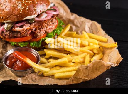 Classic take away burger with fries ketchup Stock Photo