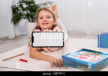 Non binary kid having fun home Stock Photo