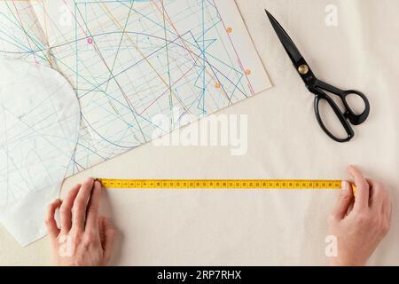 Cropped Shot Of Tailor With Measuring Tape Free Stock Photo and Image  194624566