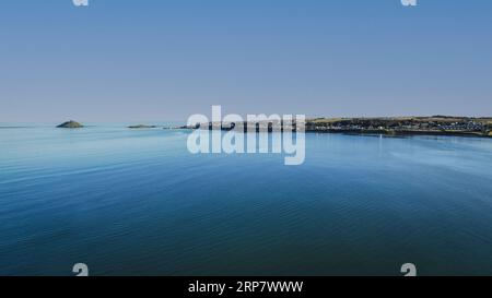 Aerial view of Ballycotton, a coastal fishing village in County Cork, Ireland, on a cloudless day Stock Photo