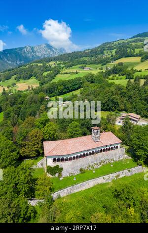 Aerial view of the Santissima Trinità di Parre church on a hill overlooking Valle Seriana. Val Seriana, Bergamo province, Lombardy, Italy. Stock Photo