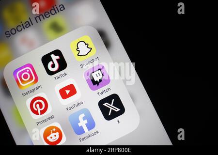 Social media icon, detailed view of a smartphone with social media apps, Facebook, Twitter, Instagram, Tik Tok, Snapchat, Pinterest, YouTube, Twitch Stock Photo