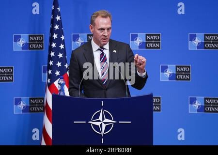 (190214) -- BRUSSELS, Feb. 14, 2019 -- Acting U.S. Secretary of Defense Patrick Shanahan attends a press conference after the NATO defence ministers meeting at the NATO headquarters in Brussels, Belgium, Feb. 14, 2019. ) BELGIUM-BRUSSELS-NATO-PRESS CONFERENCE ZhengxHuansong PUBLICATIONxNOTxINxCHN Stock Photo