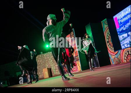 (190218) -- ASWAN, Feb. 18, 2019 (Xinhua) -- Palestinian artists dance at the opening ceremony of the 7th Aswan International Festival of Culture and Arts in Aswan, Egypt, Feb. 17, 2019. The 7th Aswan International Festival of Culture and Arts kicked off here on Sunday with the participation of folk and traditional bands from 13 African, Asian and European countries. (Xinhua/Meng Tao) EGYPT-ASWAN-CULTURE & ART FESTIVAL-OPENING PUBLICATIONxNOTxINxCHN Stock Photo