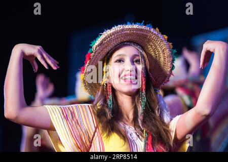 (190218) -- ASWAN, Feb. 18, 2019 (Xinhua) -- A Moroccan artist dances at the opening ceremony of the 7th Aswan International Festival of Culture and Arts in Aswan, Egypt, Feb. 17, 2019. The 7th Aswan International Festival of Culture and Arts kicked off here on Sunday with the participation of folk and traditional bands from 13 African, Asian and European countries. (Xinhua/Meng Tao) EGYPT-ASWAN-CULTURE & ART FESTIVAL-OPENING PUBLICATIONxNOTxINxCHN Stock Photo