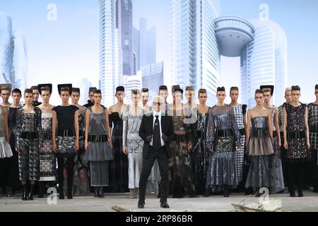 (190219) -- BEIJING, Feb. 19, 2019 (Xinhua) -- File photo taken on July 3, 2013 shows Fashion designer Karl Lagerfeld at the end of his Haute Couture Fall Winter 2013/2014 fashion show for French fashion house Chanel in Paris, France. German Fashion designer Karl Lagerfeld died in Paris at the age of 85 on Tuesday. (Xinhua/Gao Jing) FRANCE-PARIS-FASHION DESIGNER-KARL LAGERFELD-PASS AWAY PUBLICATIONxNOTxINxCHN Stock Photo