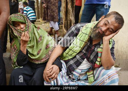 (190222) -- BEIJING, Feb. 22, 2019 -- Relatives of fire victims wail at a hospital in Dhaka, capital of Bangladesh, Feb. 21, 2019. At least 81 people have been killed Thursday after a devastating fire tore through a number of buildings in old part of Bangladeshi capital Dhaka. Commissioner of Dhaka Division, KM Ali Azam, told Xinhua that they have confirmed the deaths. Stringer) XINHUA PHOTOS OF THE DAY Naim-ul-karim PUBLICATIONxNOTxINxCHN Stock Photo