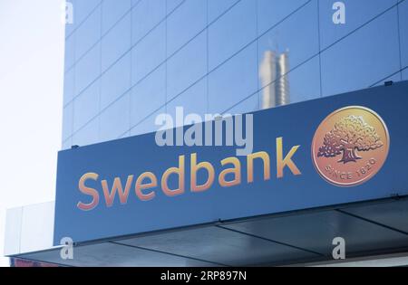 (190222) -- RIGA, Feb. 22, 2019 -- The logo of Swedbank is seen on its Latvian branch building in Riga, Latvia, Feb. 22, 2019. Earlier this week, the Swedbank group had been shaken by money laundering scandal following the report by Swedish television (SVT) that suspicious transactions of at least 40 billion Swedish krona (4.3 billion U.S. dollars) by 50 clients had been carried out between Swedbank and Danske Bank in the Baltic countries during 2007 and 2015. ) LATVIA-RIGA-SWEDBANK EdijsxPalens PUBLICATIONxNOTxINxCHN Stock Photo