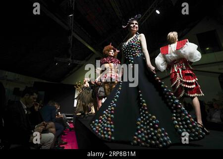 (190225) -- BEIJING, Feb. 25, 2019 -- Models display chocolate dresses during the opening show of the 6th Brussels Chocolate Salon in Brussels, Belgium, Feb. 21, 2019. ) Portraits of Feb. 2019 ZhengxHuansong PUBLICATIONxNOTxINxCHN Stock Photo