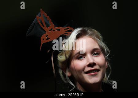 (190225) -- BEIJING, Feb. 25, 2019 -- A model wears a chocolate headdress during the opening show of the 6th Brussels Chocolate Salon in Brussels, Belgium, Feb. 21, 2019. ) Portraits of Feb. 2019 ZhengxHuansong PUBLICATIONxNOTxINxCHN Stock Photo