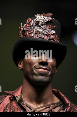 (190225) -- BEIJING, Feb. 25, 2019 -- A model wears a chocolate headdress during the opening show of the 6th Brussels Chocolate Salon in Brussels, Belgium, Feb. 21, 2019. ) Portraits of Feb. 2019 ZhengxHuansong PUBLICATIONxNOTxINxCHN Stock Photo