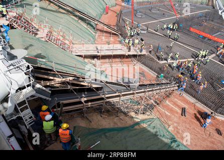 (190225) -- CAIRO, Feb. 25, 2019 -- People work at the construction ...