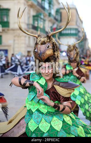 (190303) -- MALTA, March 3, 2019 (Xinhua) -- A reveler dances during the carnival parade in Valletta, Malta, on March 2, 2019. Malta carnival 2019 celebrations started on March 1 and will last till March 5. (Xinhua/Yuan Yun) MALTA-VALLETTA-CARNIVAL PUBLICATIONxNOTxINxCHN Stock Photo