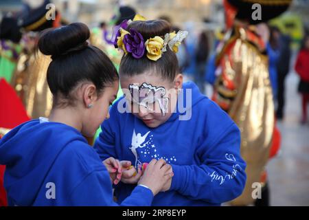 (190303) -- MALTA, March 3, 2019 (Xinhua) -- Two children are seen during the carnival parade in Valletta, Malta, on March 2, 2019. Malta carnival 2019 celebrations started on March 1 and will last till March 5. (Xinhua/Yuan Yun) MALTA-VALLETTA-CARNIVAL PUBLICATIONxNOTxINxCHN Stock Photo