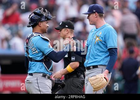 Tampa Bay Rays catcher Christian Bethancourt celebrates with relief pitcher  Pete Fairbanks (29) after they defeated the Texas Rangers during a baseball  game, Sunday, Sept. 18, 2022, in St. Petersburg, Fla. (AP