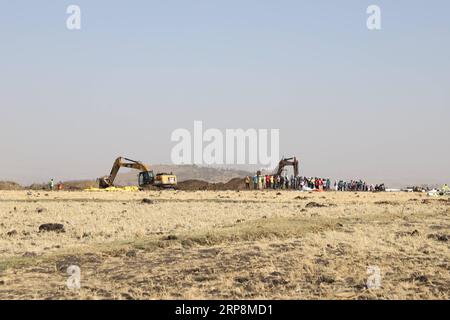 (190311) -- ADDIS ABABA, March 11, 2019 -- Photo taken on March 11, 2019 shows the crash site of an Ethiopian Airlines plane near Bishoftu town, about 45 km from the capital Addis Ababa, Ethiopia. The Nairobi-bound Boeing 737-8 MAX crashed on Sunday, just minutes from takeoff from Addis Ababa Bole International Airport, killing all 157 people aboard. Earlier on Monday, Ethiopian Airlines announced its decision to suspend commercial operations of all Boeing 737-Max 8 aircraft. ) ETHIOPIA-BISHOFTU-ETHIOPIAN AIRLINES-JET CRASH MichaelxTewelde PUBLICATIONxNOTxINxCHN Stock Photo