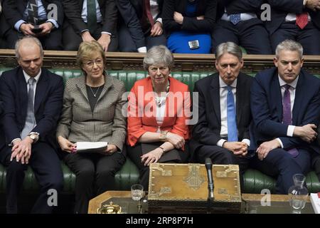 (190313) -- BEIJING, March 13, 2019 -- British Prime Minister Theresa May (C) is seen during the Brexit deal vote in the House of Commons in London, Britain, on March 12, 2019. British Prime Minister Theresa May s Brexit deal was rejected again on Tuesday by MPs in the second meaningful vote in the parliament since January, increasing uncertainty about how the country will leave the European Union. UK Parliament/) HOC MANDATORY CREDIT: UK PARLIAMENT/ XINHUA PHOTOS OF THE DAY JessicaxTaylor PUBLICATIONxNOTxINxCHN Stock Photo
