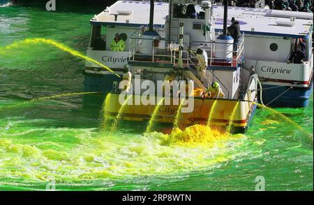 (190317) -- BEIJING, March 17, 2019 (Xinhua) -- Workers dye the Chicago River green to celebrate St. Patrick s Day in Chicago, the United States, on March 16, 2019. The St. Patrick s Day is marked on March 17. (Xinhua/Wang Qiang) XINHUA PHOTOS OF THE DAY PUBLICATIONxNOTxINxCHN Stock Photo